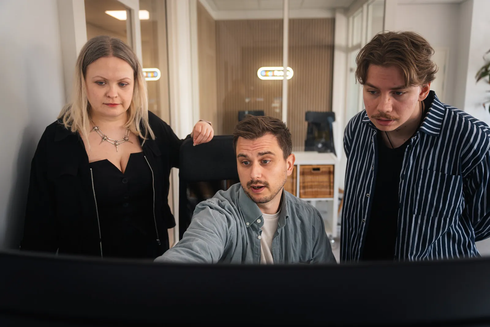 Developers review the site structure on a computer